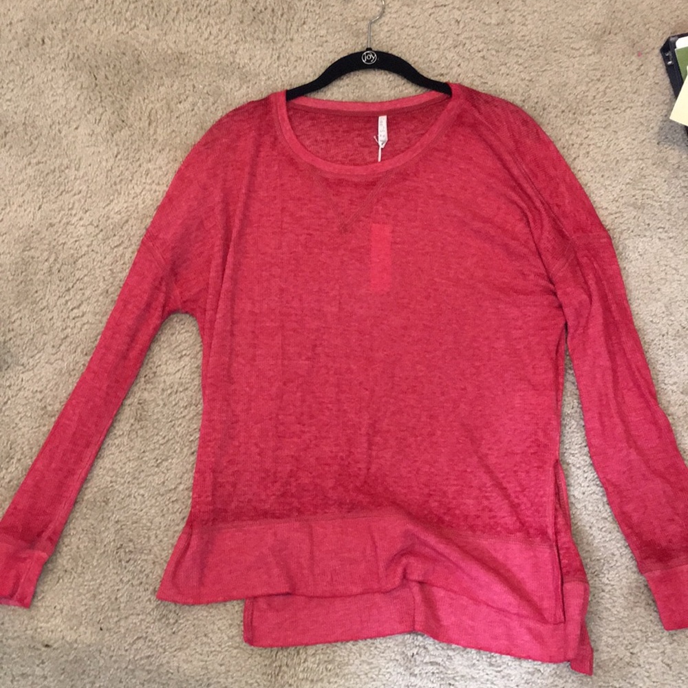 Red long sleeved top
